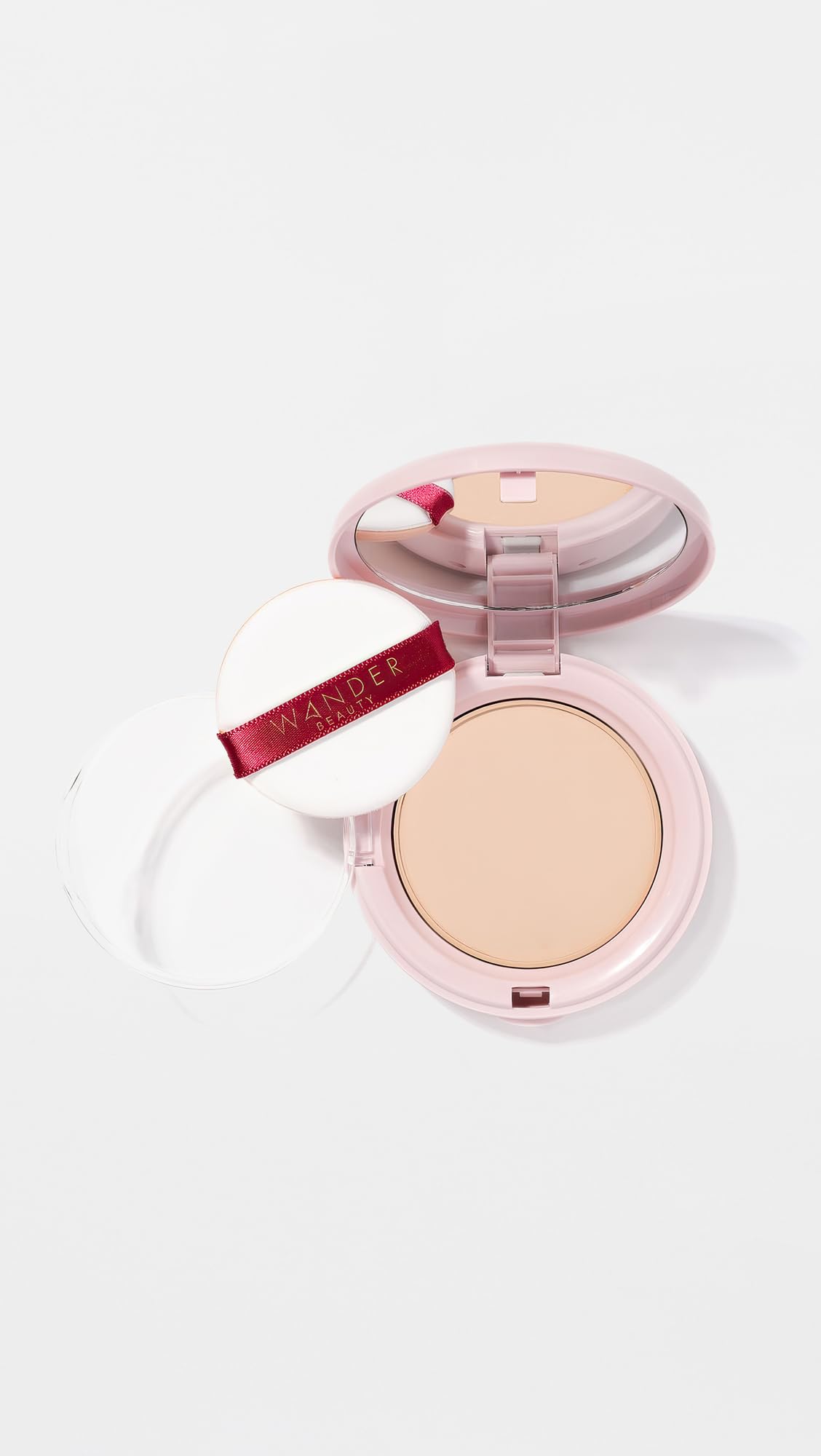 Wander Beauty open pan texture close-up displays finely milled powder and smooth finish