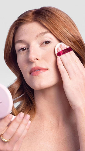 Wander Beauty compact held in hand to show scale and travel-friendly convenience