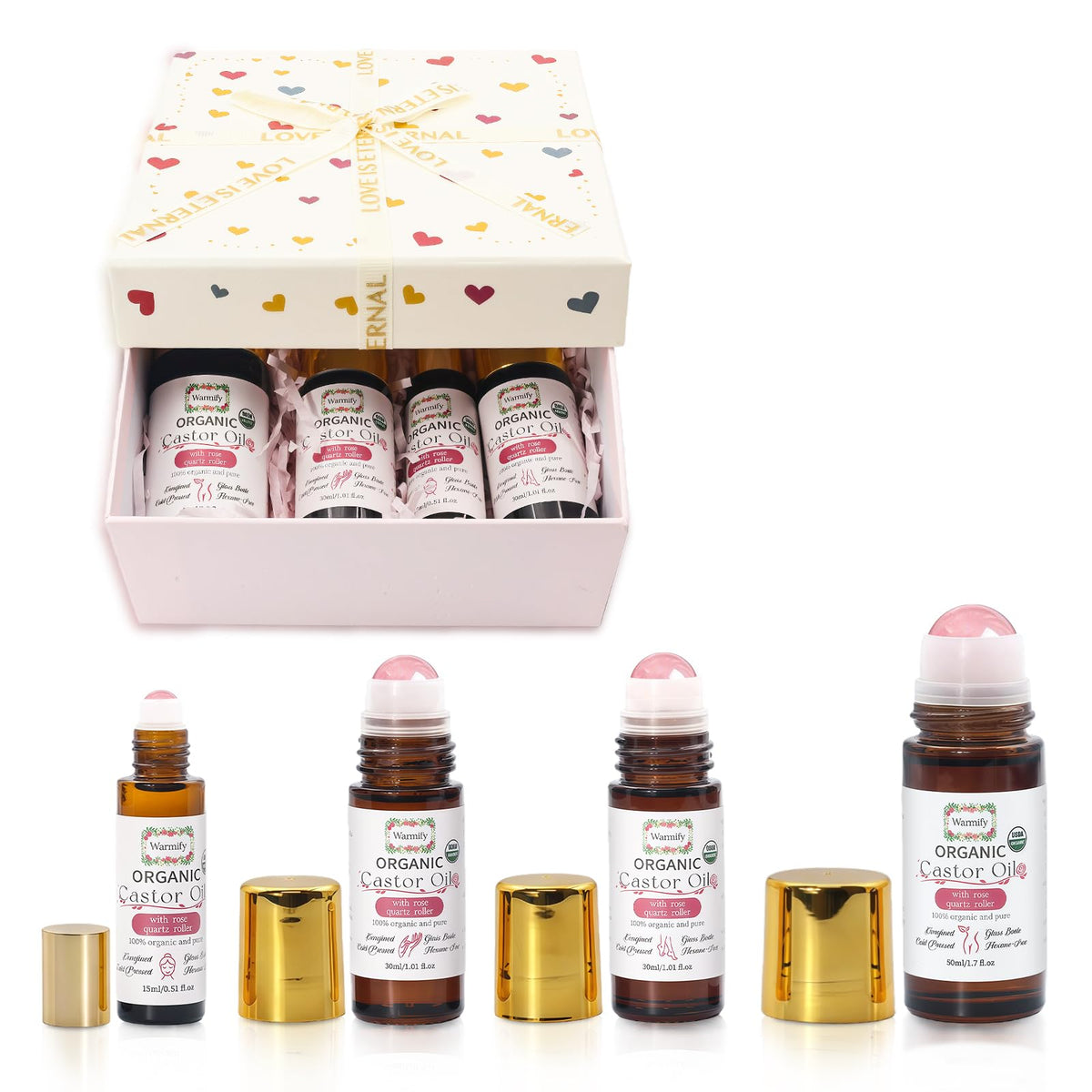 Warmify front packaging showing four labelled bottles and rose quartz rollers for cohesive self-care