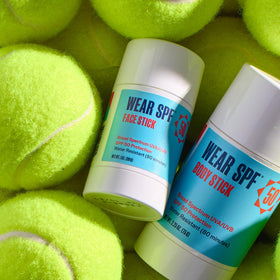 Runner applying WearSPF during training for long-lasting sun defense