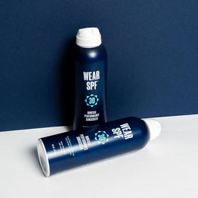 WearSPF bottle size comparison in hand conveying portability and easy on-the-go reapplication
