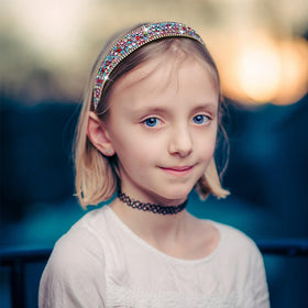 Wecoe headband worn by model styled for prom showcasing elegant shine