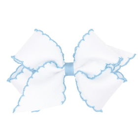 Wee Ones front view of white with blue medium grosgrain bow showing polished look