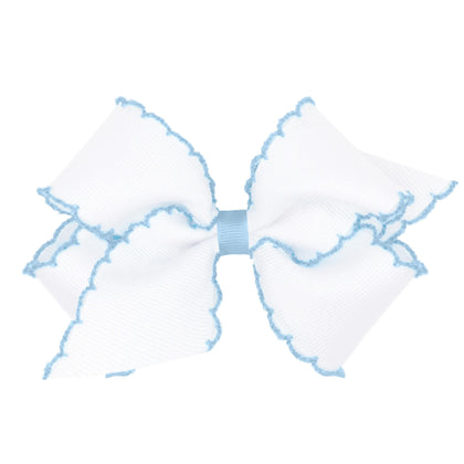 Wee Ones front view of white with blue medium grosgrain bow showing polished look