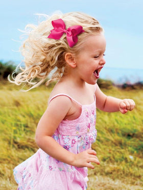 Wee Ones bow on child in school outfit showing versatile style and comfortable wear