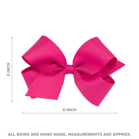 Wee Ones packaging and brand tag showing handcrafted quality and gift-ready presentation