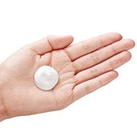 Weleda Almond Soothing Cleansing Lotion next to travel items showing 2.5 oz compact size ideal for trips and trial use