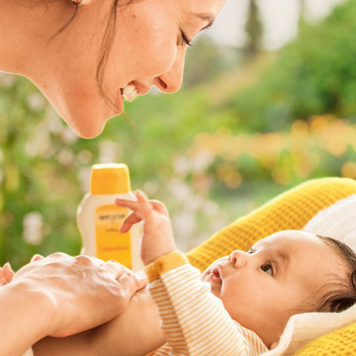 Weleda creamy lotion texture close-up illustrating fast absorption benefit