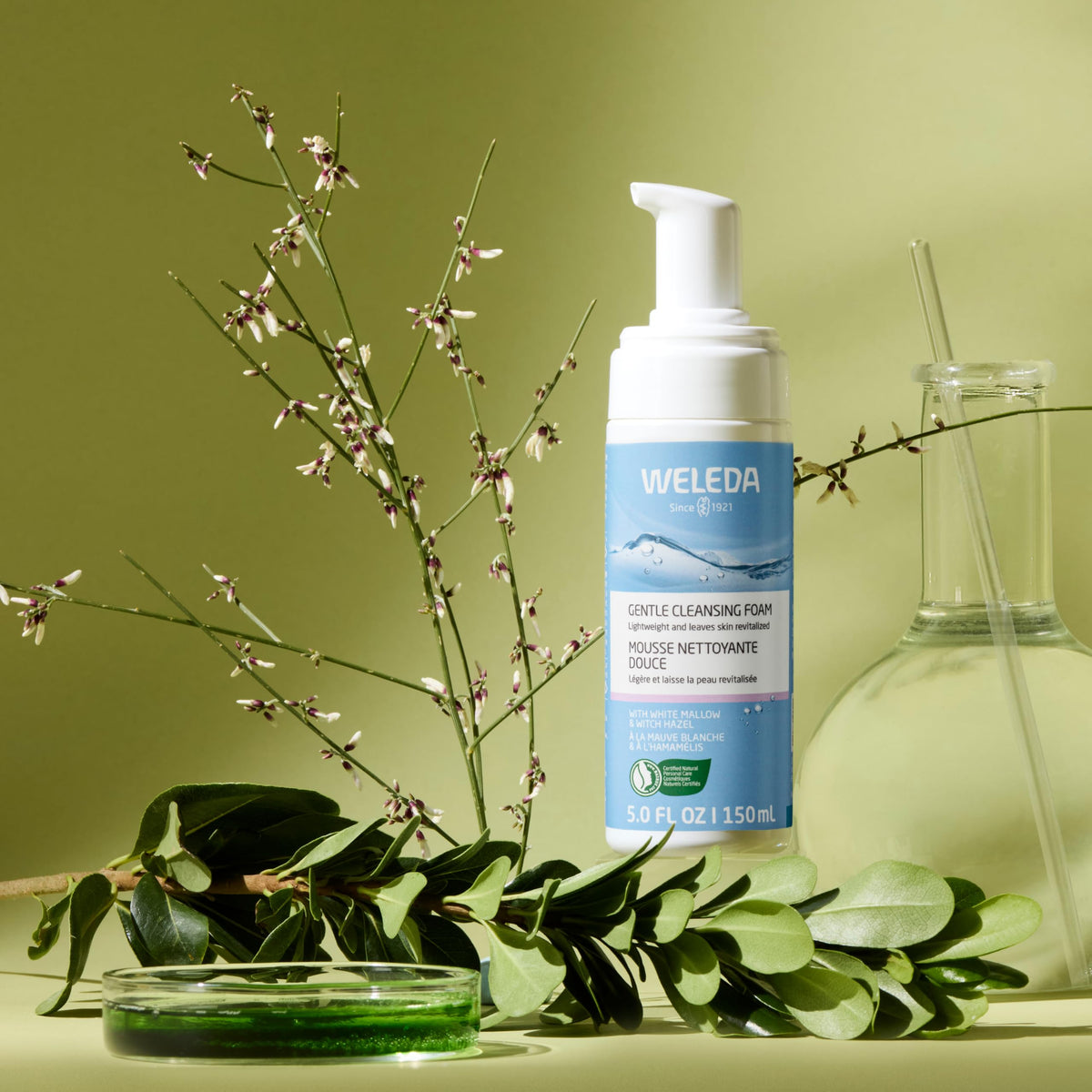 Weleda gentle cleansing foam dispensed in hand demonstrating easy application