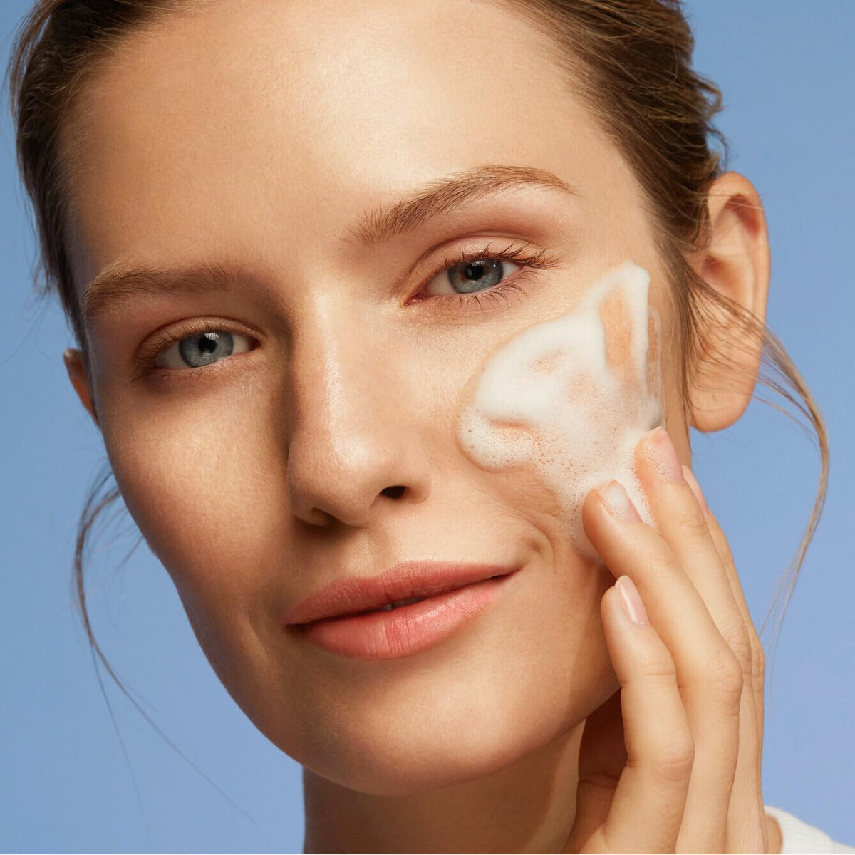Weleda gentle cleansing foam airy texture close-up highlights mild lather