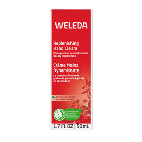 Weleda cream beside shea and pomegranate display indicating nourishing oils