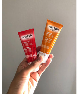 Weleda tube next to keys and wallet showing 1.7 oz travel-friendly size