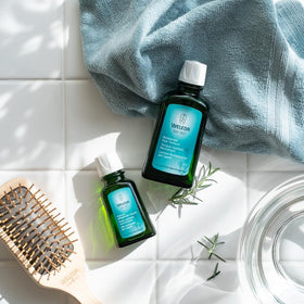Weleda texture drop on fingertip showing lightweight liquid and quick-absorption benefit