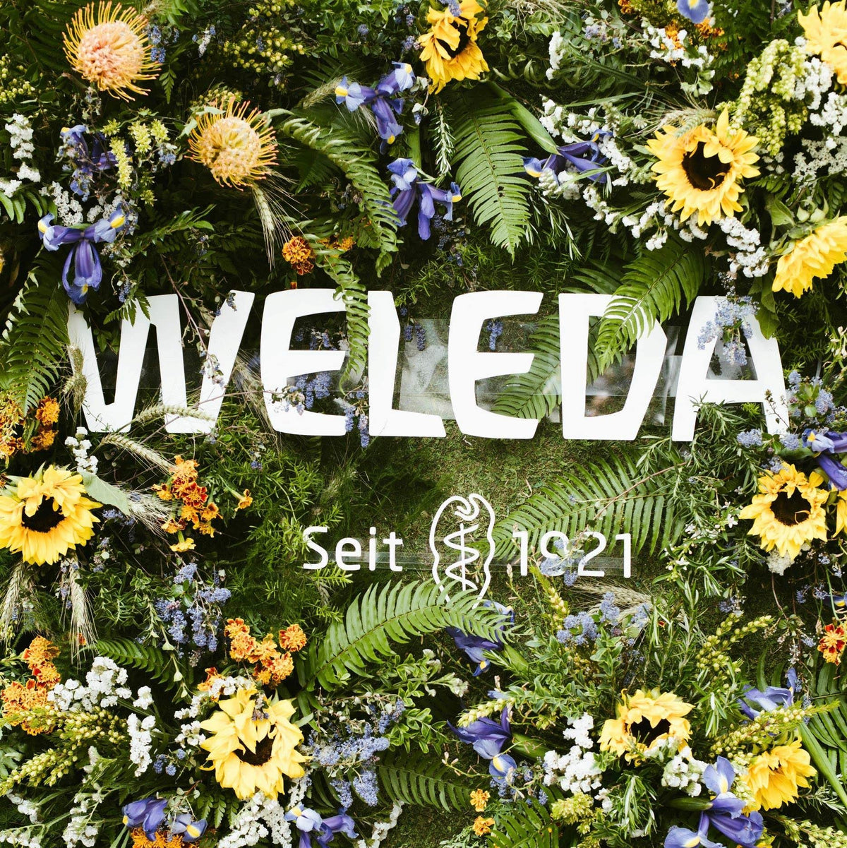Weleda oil on bathroom vanity suggesting daily natural skincare ritual