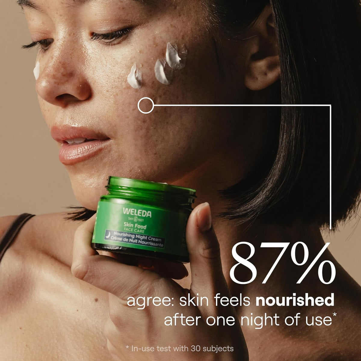 Weleda Skin Food applied on hand illustrating absorbent, non-greasy finish