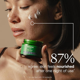 Weleda Skin Food applied on hand illustrating absorbent, non-greasy finish