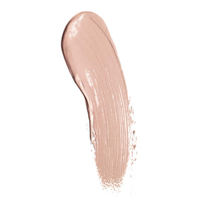 Well People creamy concealer texture close-up displaying smooth, blendable finish