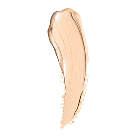 Well People creamy concealer texture close-up demonstrating blendability