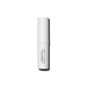 Well People complexion stick peeking from a small bag illustrating on-the-go touch-up benefit
