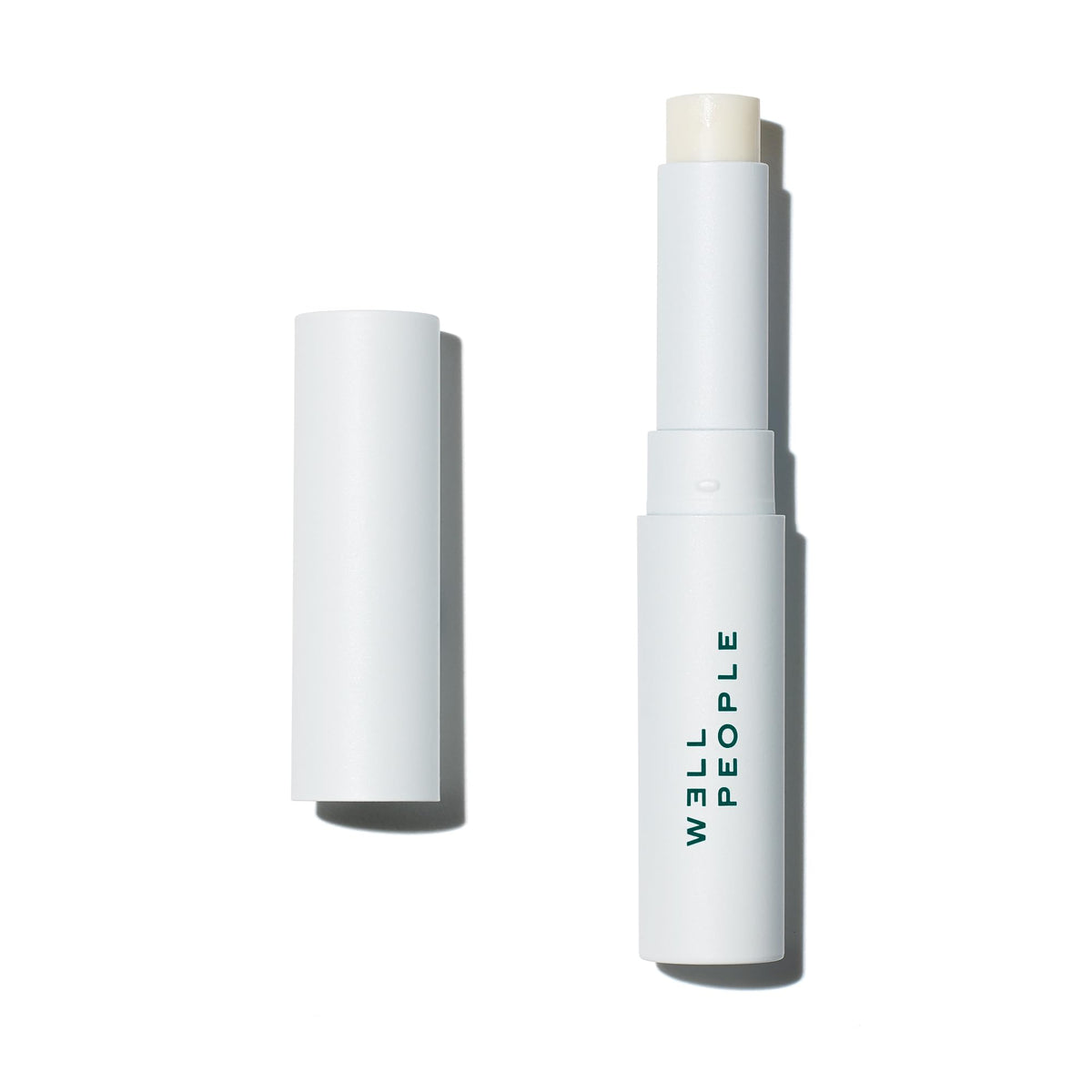Well People front packaging showing tinted lip butter and brand benefit