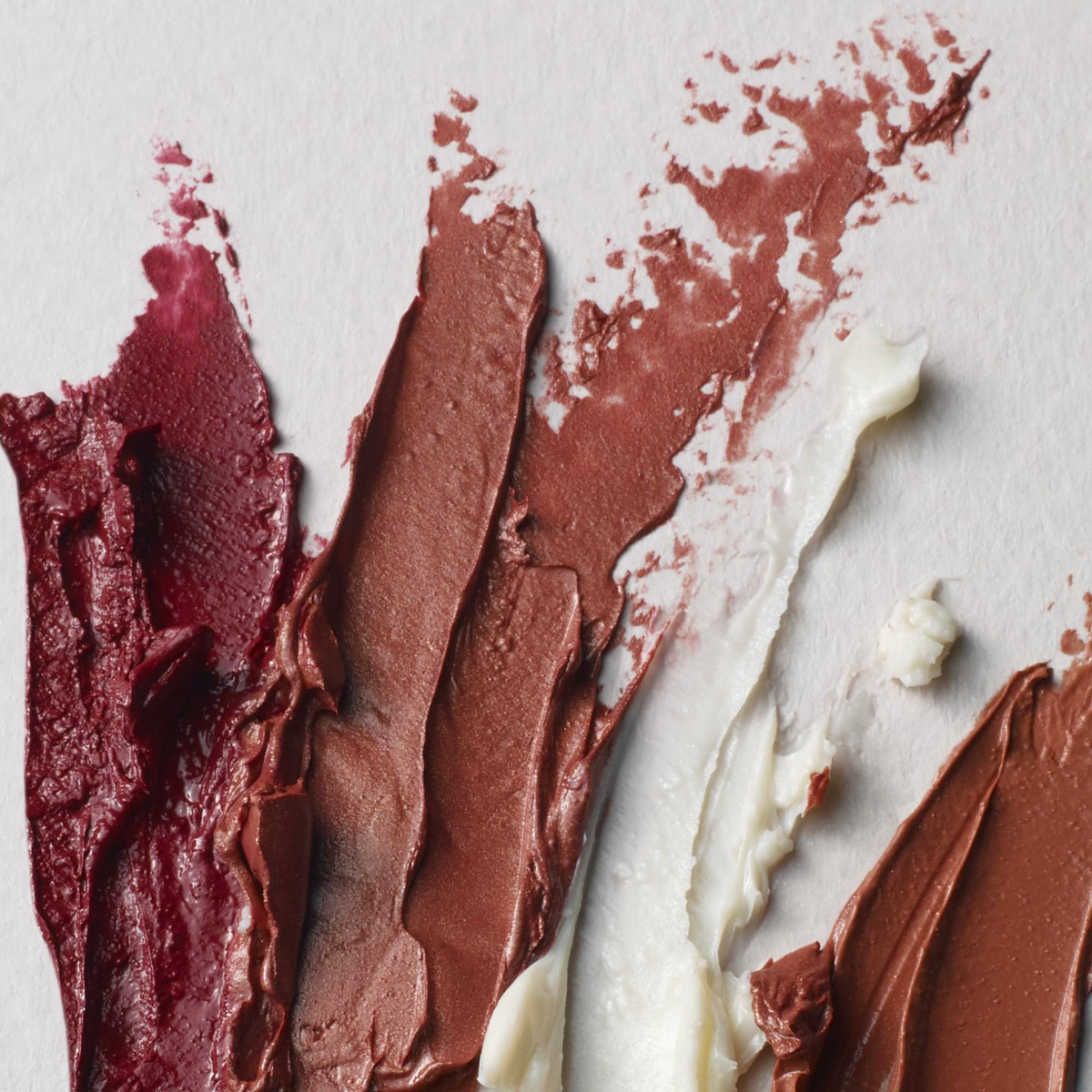 Well People ingredients flatlay with plant oils showing natural formulation