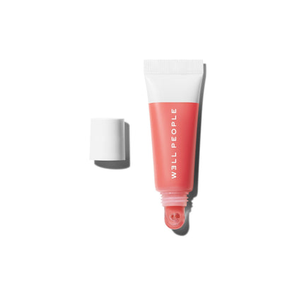 Well People front compact tube showing pink grapefruit tint and clean design benefit hydration