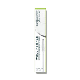 Well People tube beside coin for scale, compact travel-friendly brow gel