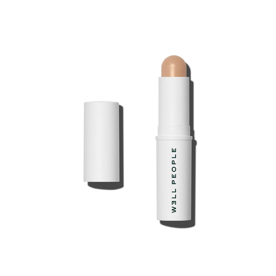 Well People front packaging of Supernatural complexion stick showing shade label and compact benefit