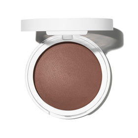 Well People bronzer applied with brush demonstrating easy buildable warmth