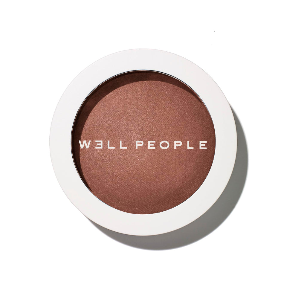 Well People compact front view showing bronzer shade and packaging benefit