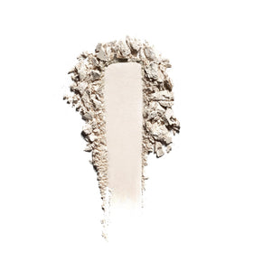 Well People close-up of baked powder texture showing silky, light-reflecting surface