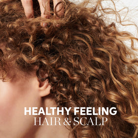 Wella Professionals back label listing natural origin and sulfate-free benefit