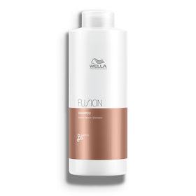 Wella Professionals front packaging showing 33.8 oz bottle and clear branding benefit