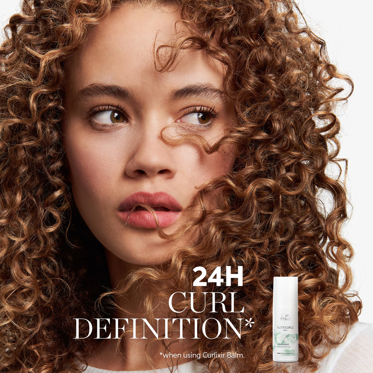 Wella Professionals Nutricurls balm texture close-up highlighting creamy consistency for smooth application