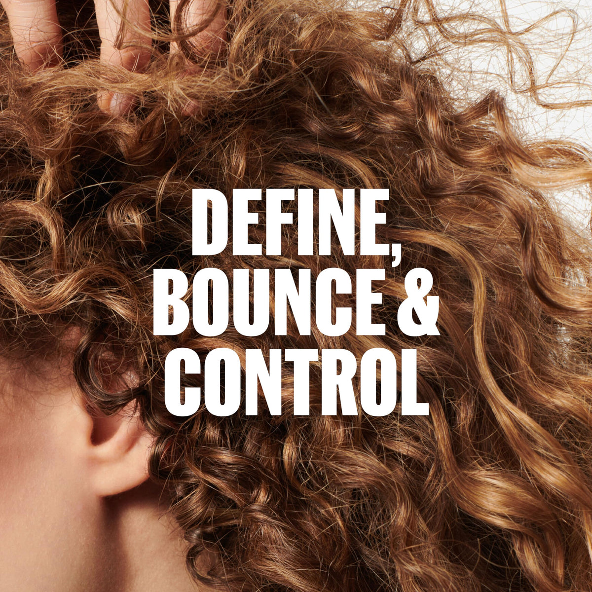 Wella Professionals applying product to damp curls demonstrating ease of use and frizz control