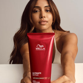 Wella Professionals bottle styled on bathroom shelf demonstrating salon look