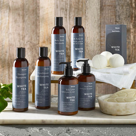 Westin bottle staged with towel and soap evoking spa-like bathroom refreshment
