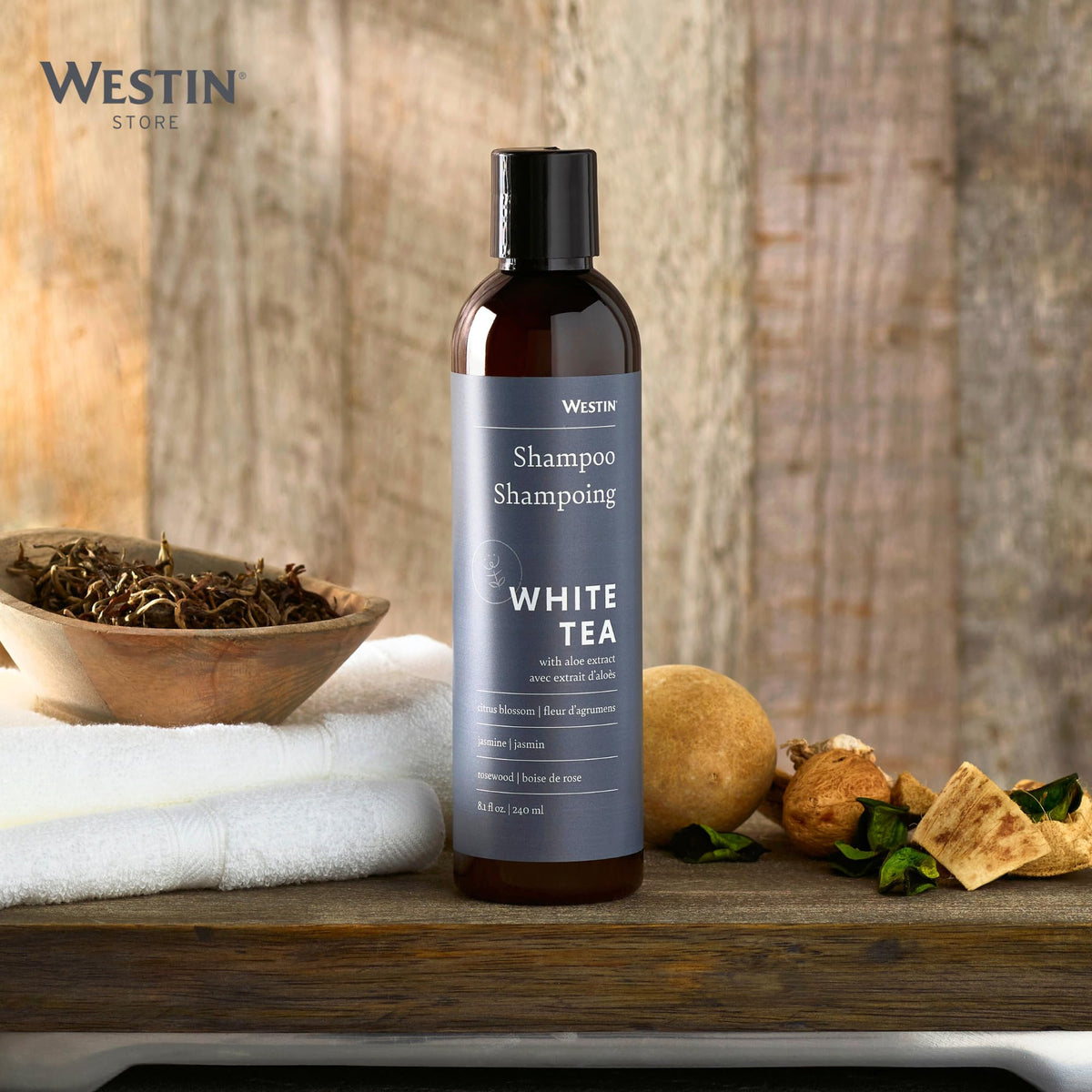 Westin shampoo scale comparison hand holding bottle shows compact 8-ounce size