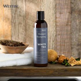 Westin shampoo scale comparison hand holding bottle shows compact 8-ounce size