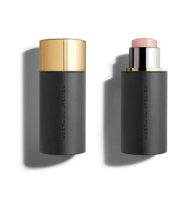 Westman Atelier nectar swatched on skin demonstrating glassy golden-peach glow and hydration