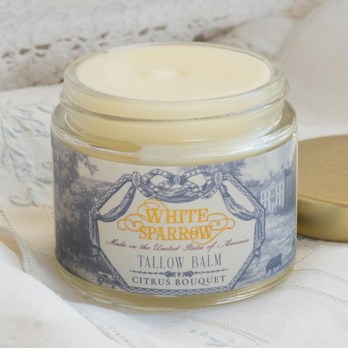 White Sparrow Farmacy front jar showing label and compact 2 oz size benefit