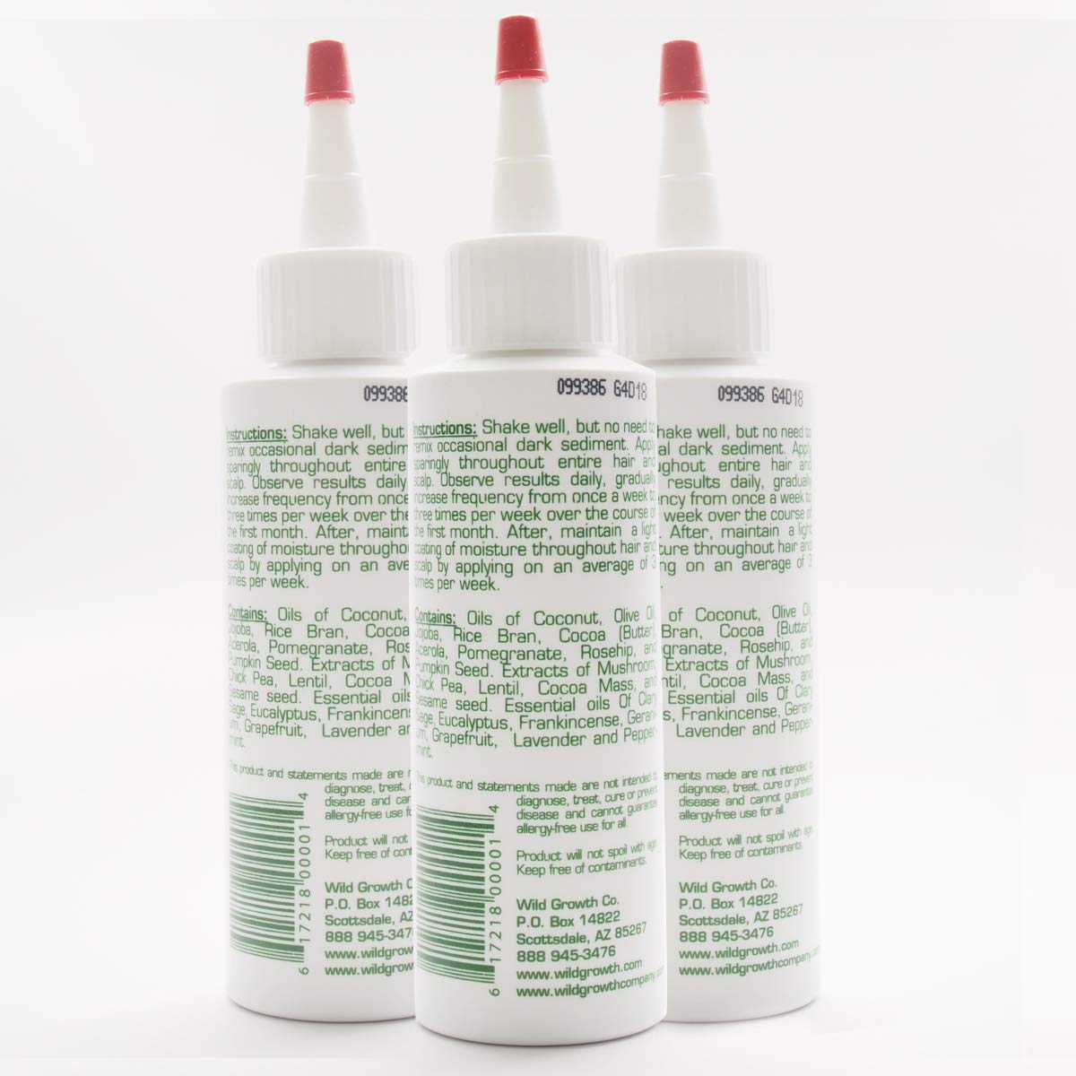 Wild Growth applying a few drops with fingertips to hair for easy detangling benefit