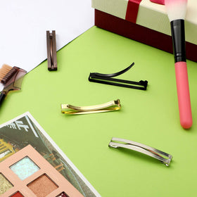 WILLBOND clip beside ruler for scale showing compact size and travel convenience