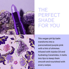Winky Lux amethyst open cap close-up revealing balm bullet texture and immediate hydration