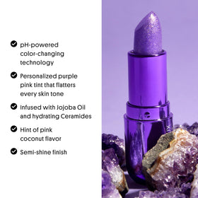 Winky Lux amethyst size comparison next to everyday items for portability and travel ease