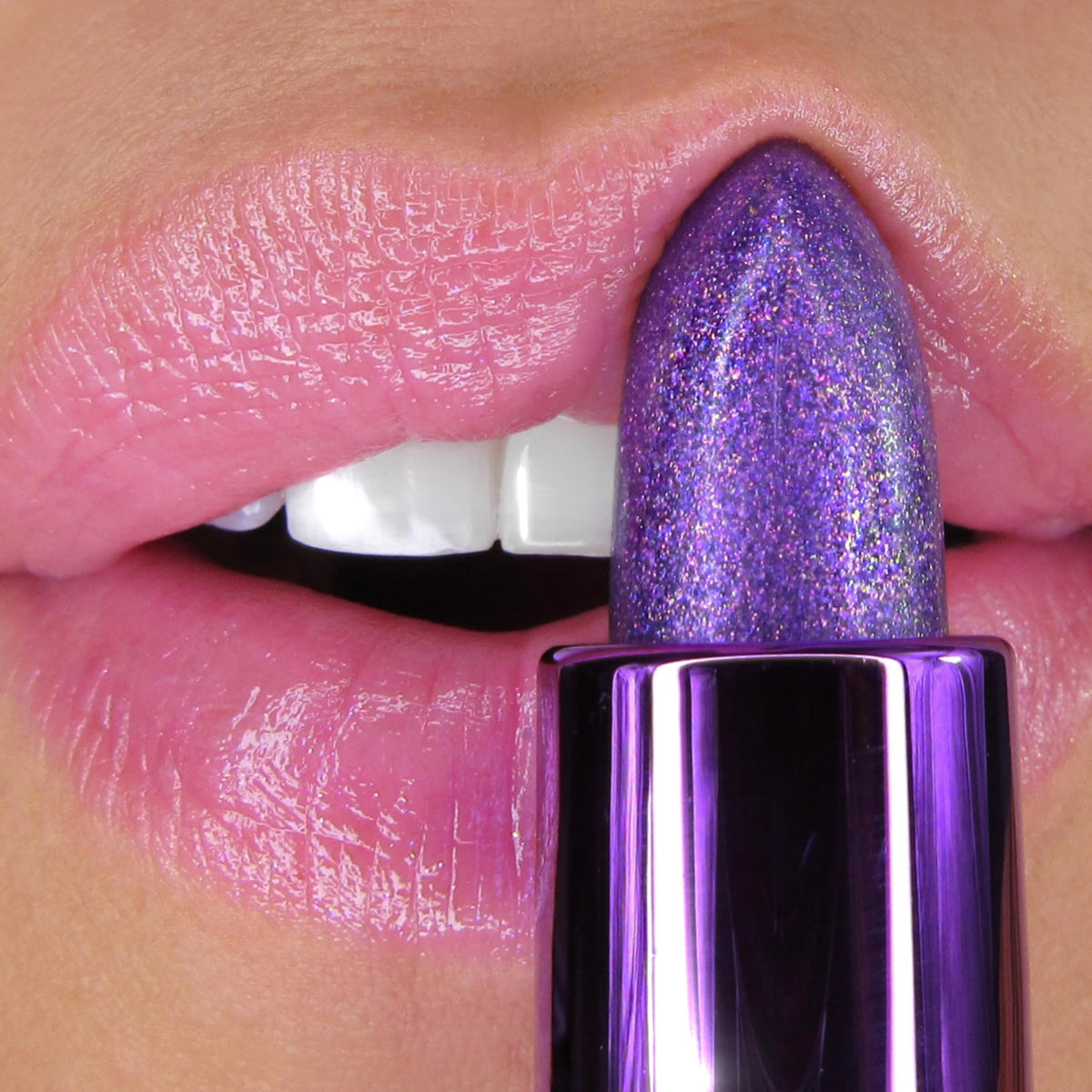 Winky Lux amethyst texture swirl showing creamy formula and visible shimmer for luminous finish
