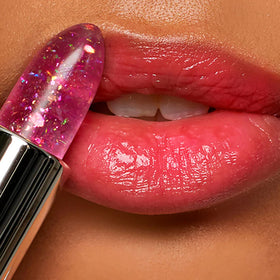 Winky Lux applied on lips showing personalized pink tint and natural sheen