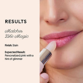 Winky Lux balm applied on lips exhibiting sheer pink tint and luminous finish