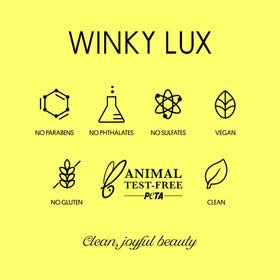 Winky Lux balm inside a bag to show compact size and on-the-go convenience