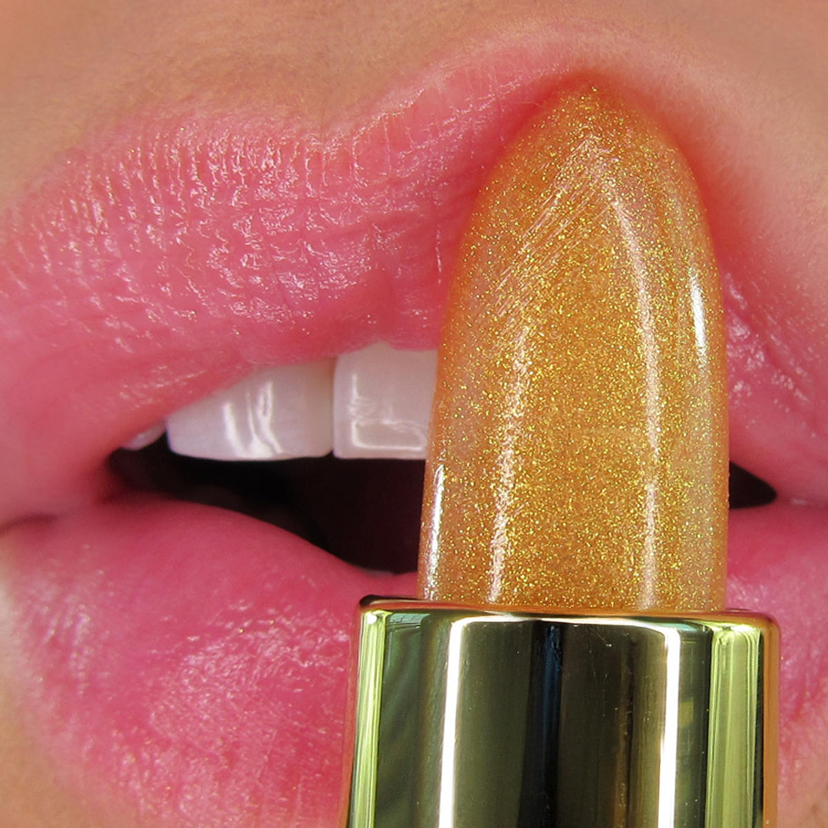 Winky Lux swatch on arm revealing warm pink tint that personalizes to skin pH